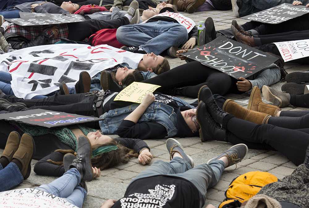 Students hold silent protest with Die-in