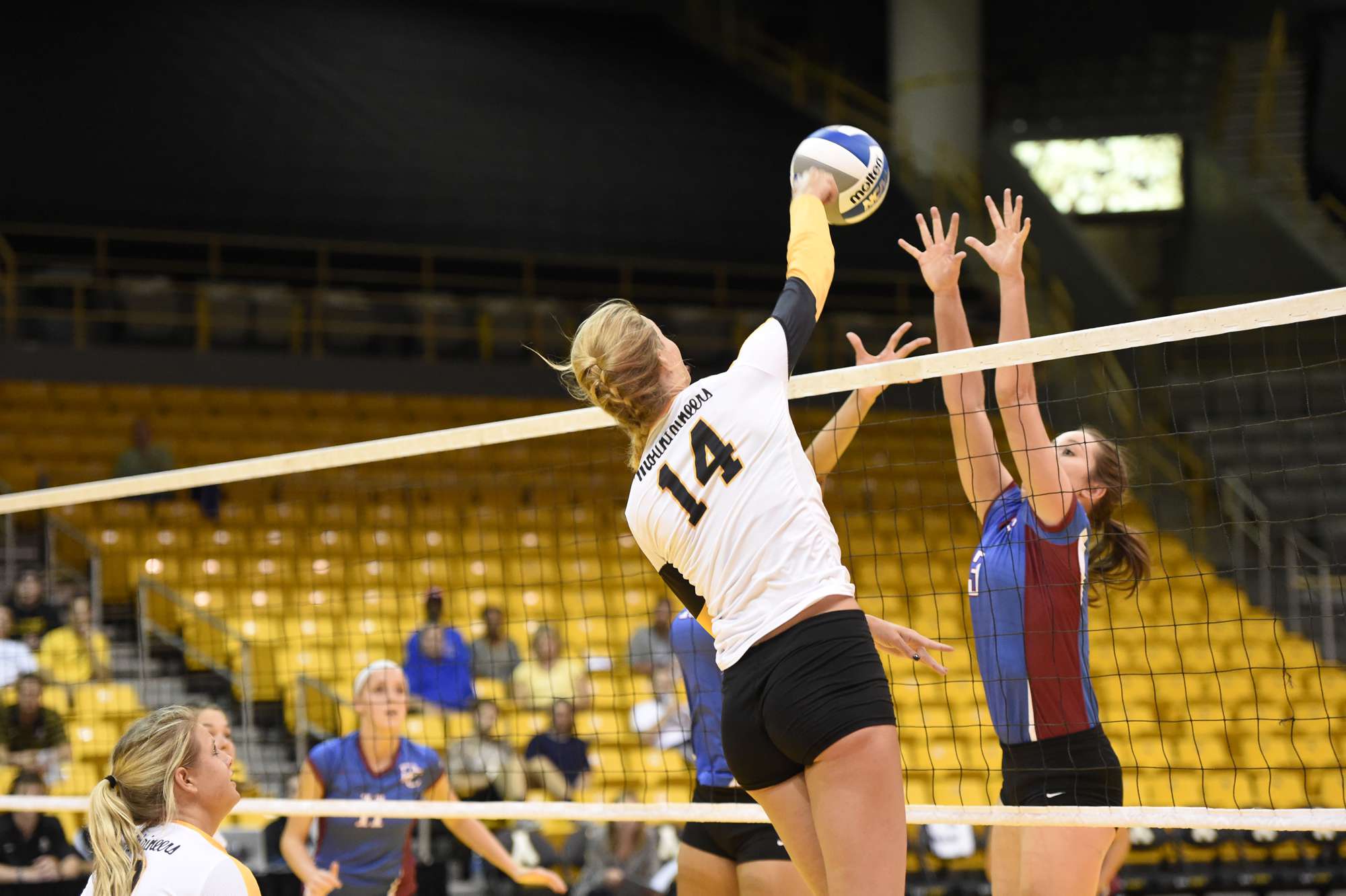 Former App State middle blocker Lauren Gray goes up for the attack during last year’s home game against Presbyterian. Gray, who finished fifth in conference hitting percentage (.314), 
graduated last year. 