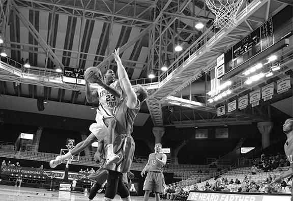 Junior guard Mike Neal powers through to the basket against North Greenville on Wednesday night. The Mountaineers defeated the Crusaders 78-70. Photo by Aneisy Cardo | The Appalachian