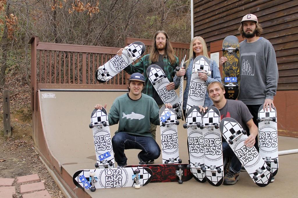 Wade+Montgomery+and+Pete+DeRose%2C+owners+of+Local+and+sponsors+of+Afford+a+Board%2C+purchased+13+skateboards+from+Recess%2C+owned+by+J.P.+Pardy%2C+to+donate+to+less+fortunate+children+unable+to+buy+skateboards.+%28From+top+left+to+right%29+J.P.+Pardy%2C+Ashley+Pardy%2C+Wade+Montgomery%2C+Pete+DeRose+and+Phill+Baldwin+show+the+skateboards+being+given+to+the+children+outside+of+Recess+on+the+skate+ramp.+Photo+by+Molly+Cogburn+%7C+The+Appalachian