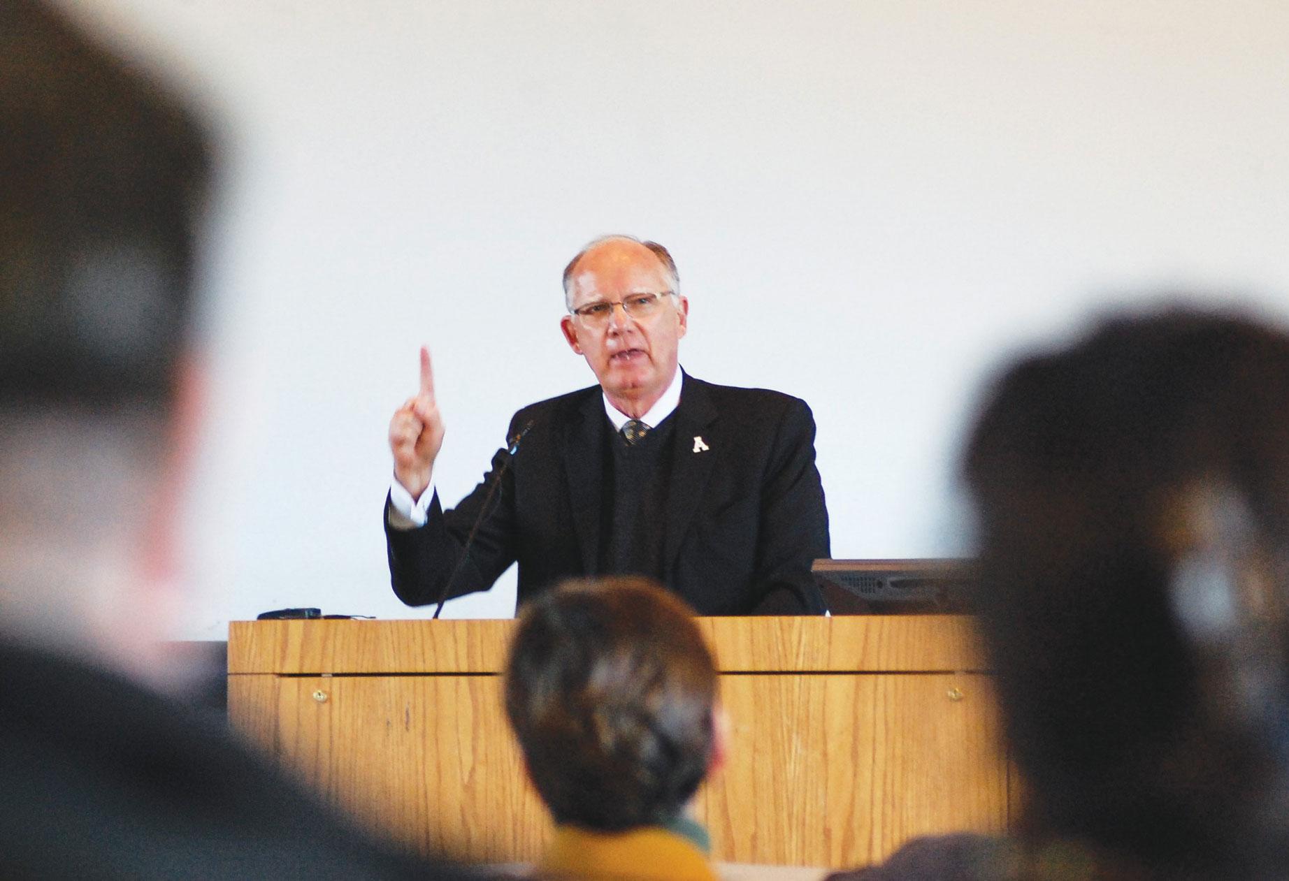 Chancellor Kenneth Peacock speaks to Appalachian State University Faculty Senate during their meeting Friday. Peacock addressed the university's new mission statement and asked for support in defense of the statement, which is currently facing opposition by the UNC Board of Governors. Photo by Dana Clarke  |  The Appalachian