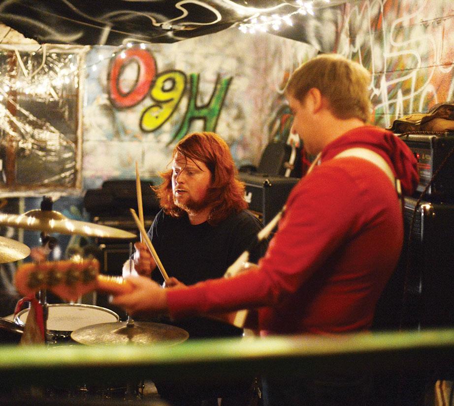 Ryan Hoots (left) and Chris French (right) of Muscle & Bone play Sunday evening at the Wood Circle House. The Wood Circle House’s first show of the season showcased five bands, including headliner Discourse. Photo by Olivia Wilkes  |  The Appalachian