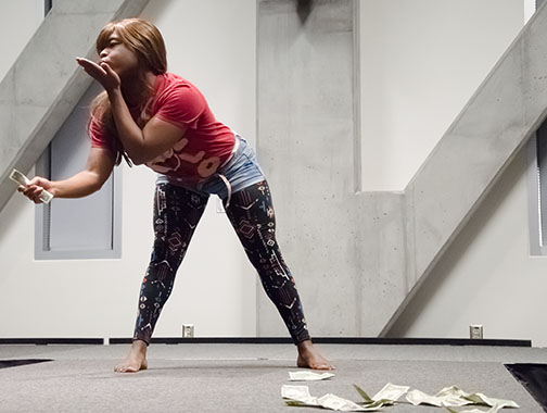 Junior social studies education major Cedric Bowie, also known as Trophy Wife, blows a kiss to a tipper during a performance. Bowie, who won the amateur show earlier this semester, will perform at the professional show Saturday at 8 p.m. in Legends.  Photo by Kim Reynolds  |  The Appalachian