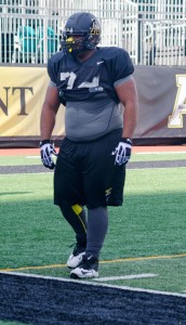 Defensive lineman Tyson Fernandez at Monday evening's football practice at Kidd Brewer Stadium. Photo by Morgan Cook  |  The Appalachian
