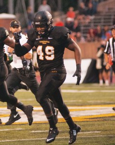 Defensive lineman Ronald Blair runs the field at the football game against Campbell University at Kidd Brewer Stadium. Photo by Rachel Krauza  |  The Appalachian