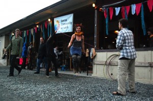 Senior art major Abby Helton jumps rope on Saturday at the Appalachian Mountain Brewery. Helton said this fundraiser for the Boone Community Network is a great chance for the group to get together and share new ideas. Photo by Cara Croom  |  The Appalachian