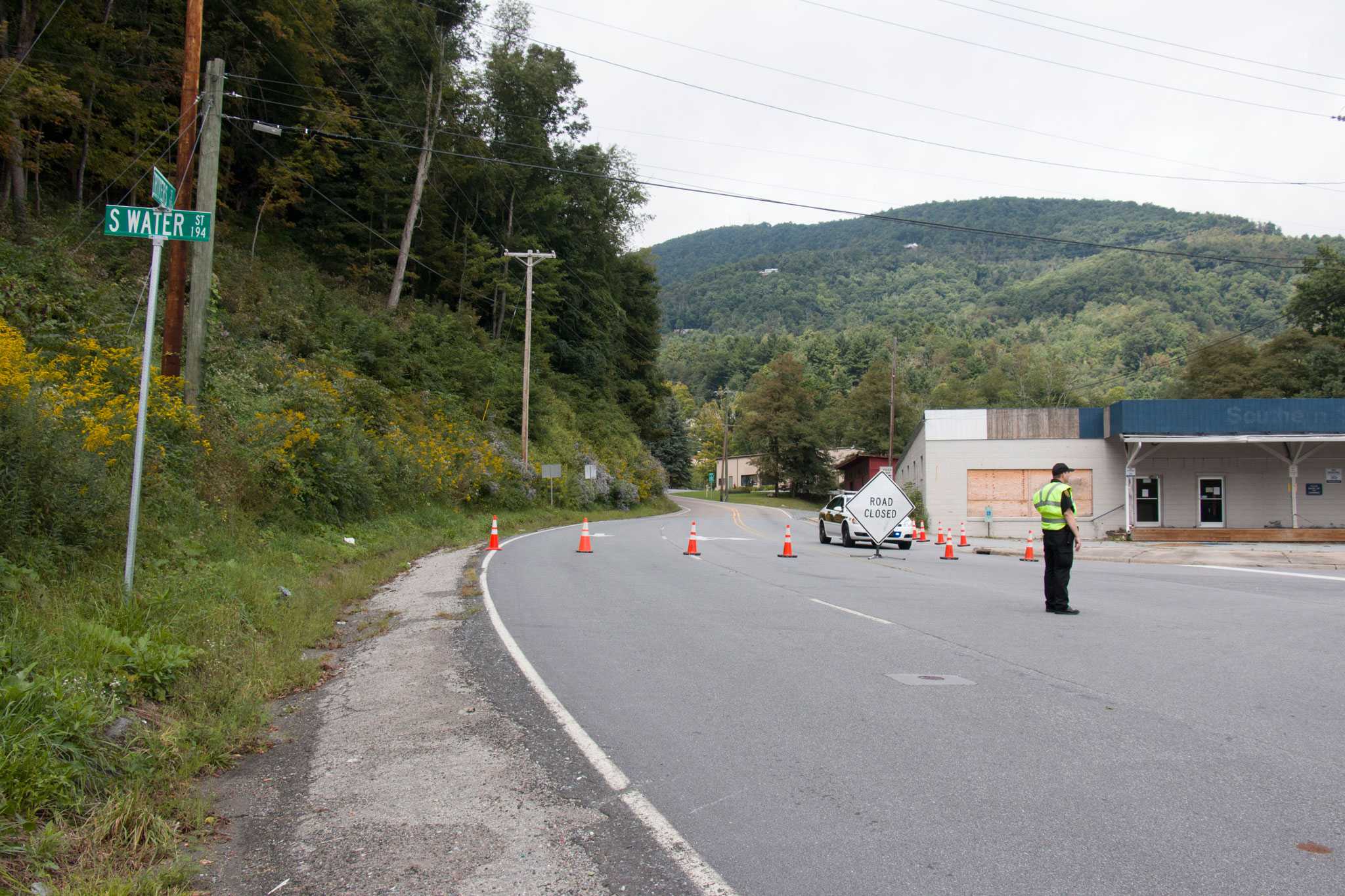 Officers stand by a roadblock on the intersection of South Water Street and Rivers Street where an unidentified body was found earlier today.  Photo by Chris Deverell  |  The Appalachian