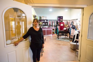 Elena Romagni stands in her new shop, Redeux Boutique, on Boone Heights Drive Monday afternoon.