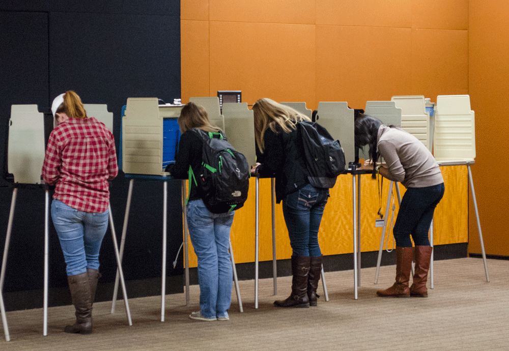 ASU students participating in early voting in Price Lake Ballroom Friday afternoon. Early voting began Oct. 23 and will continue until Nov. 1. Photo by Morgan Cook  |  The Appalachian