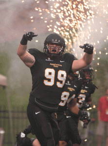 Junior defensive lineman Stephen Burns gets pumped for the first football game of the season at Kidd Brewer Stadium. Photo by Rachel Krauza  |  The Appalachian