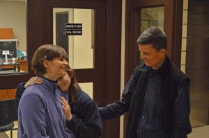 Appalachian State University English lecturer Katie Adams (right) looks on as her wife, Elizabeth Wilson (left) embraces their son Gaylin (center). Adams and Wilson were married Monday morning at the Watauga County Courthouse, marking the first same-sex marriage in Watauga County. Photo by Gerrit Van Genderen  |  The Appalachian