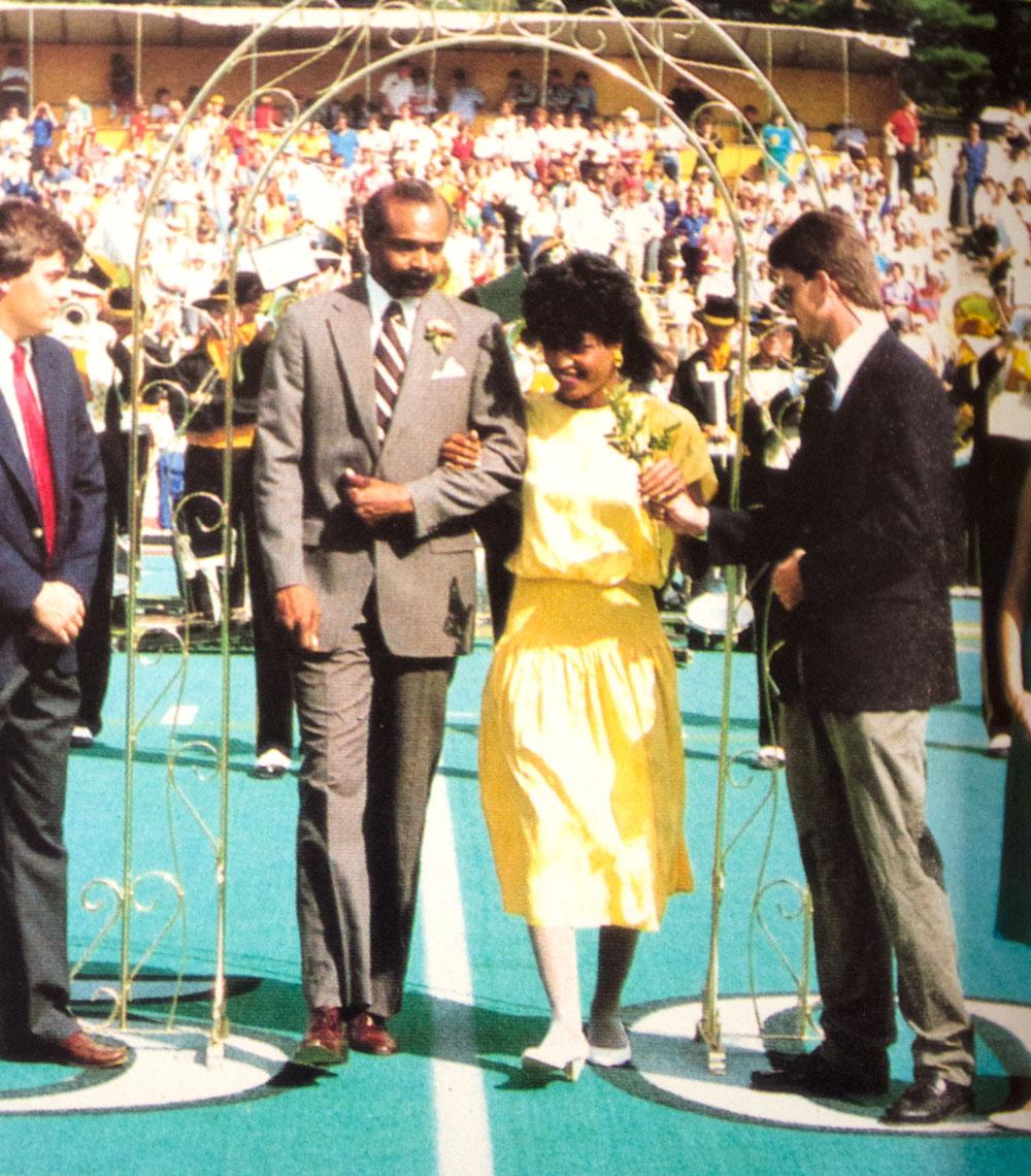 Alumna Debi Phifer-Smith being introduced as Homecoming Queen in 1986 at Kidd Brewer Stadium. Phifer-Smith was the first African American to win the crown after ASUs integration. Courtesy of The Rhododenron Volume 65 (Yearbook)