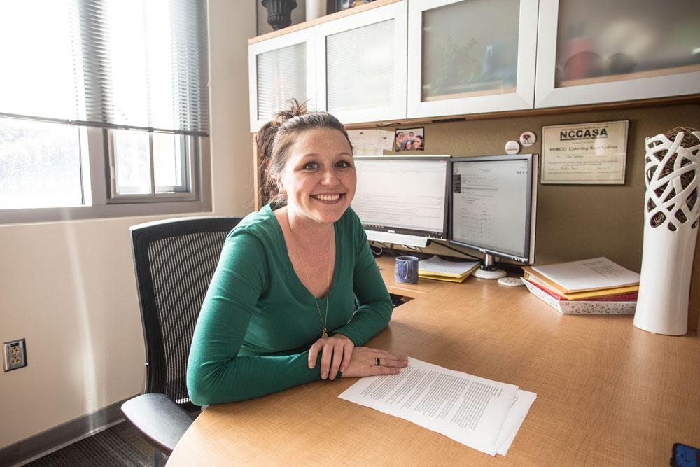 Assistant Director of Student Conduct Ellen Hartman in her office in Plemmons Student Union last Wednesday. Hartman convinced the Avon Foundation for Women to give Appalachian State University a $5,000 grant for a Bystander Fellows Institute. Photo by Kelly Walker  |  The Appalachian