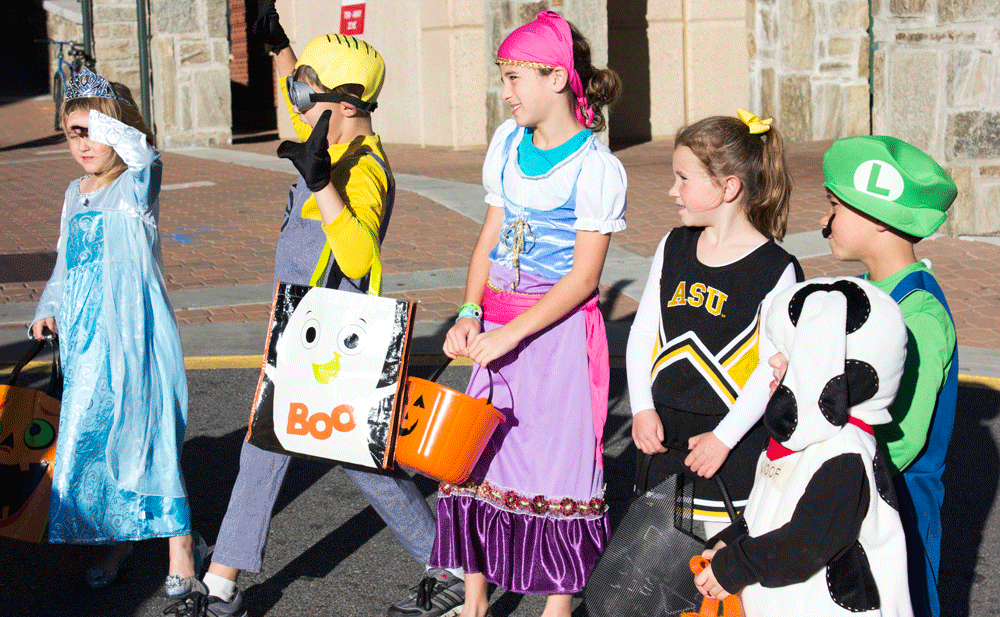 Children trick-or-treating on campus Thursday evening. Photo by Halle Keighton  |  The Appalachian