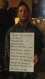 Protestor Stephen Lindemann holds a handmade sign expressing his anger toward the events that occurred in Ferguson, Missouri. Photo by Laney Ruckstuhl  |  The Appalachian