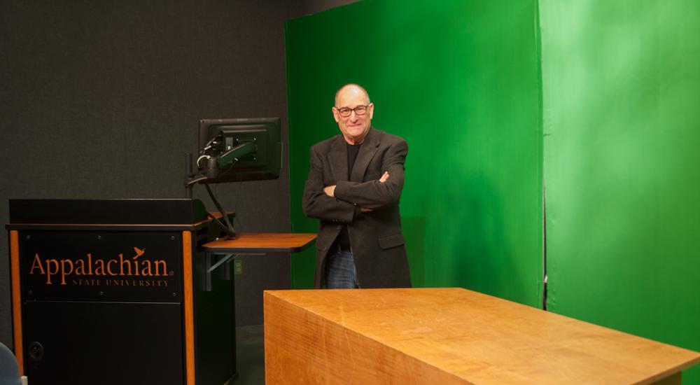 Manager of communication Michael Fields in the green screen room of Beasley Media Complex Monday afternoon. Photo by Morgan Cook  |  The Appalachian