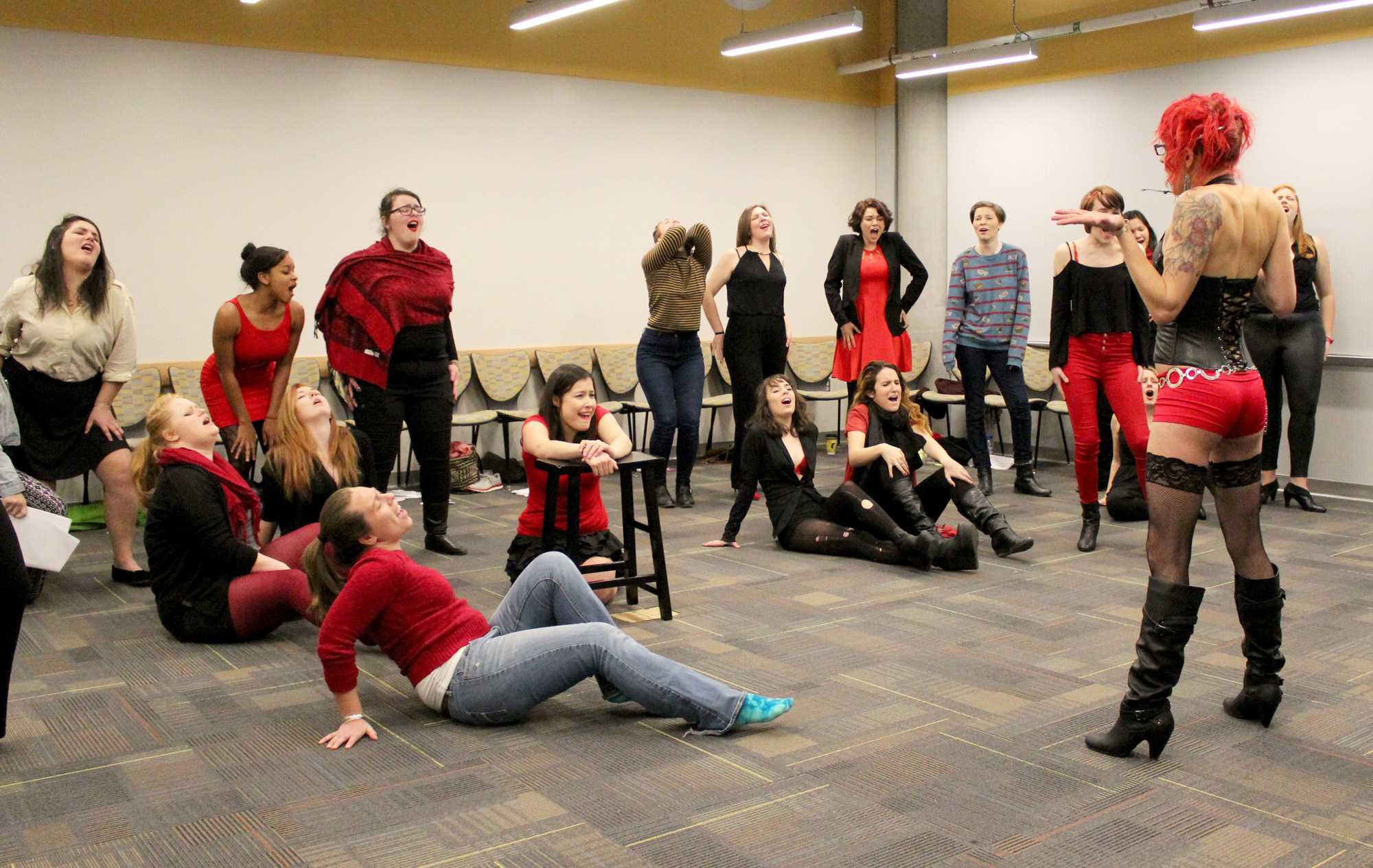 Vagina Monologues cast member Georgia Bowen (right) leads the cast during rehearsal. Photo by Emma Kovasckitz  |  The Appalchian