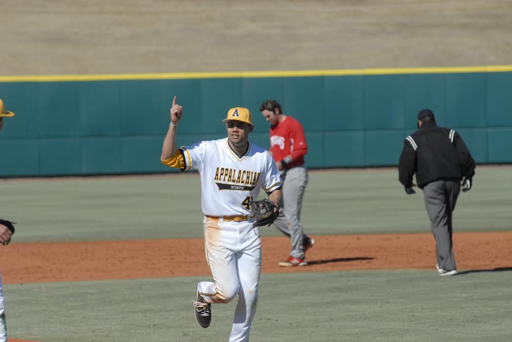 Junior middle infielder Dillon Dobson looks at the dugout during a game against N.C. State last season. Dobson went 10-15 last week to raise his season batting average to .337. 
Cory Spiers | The Appalachian