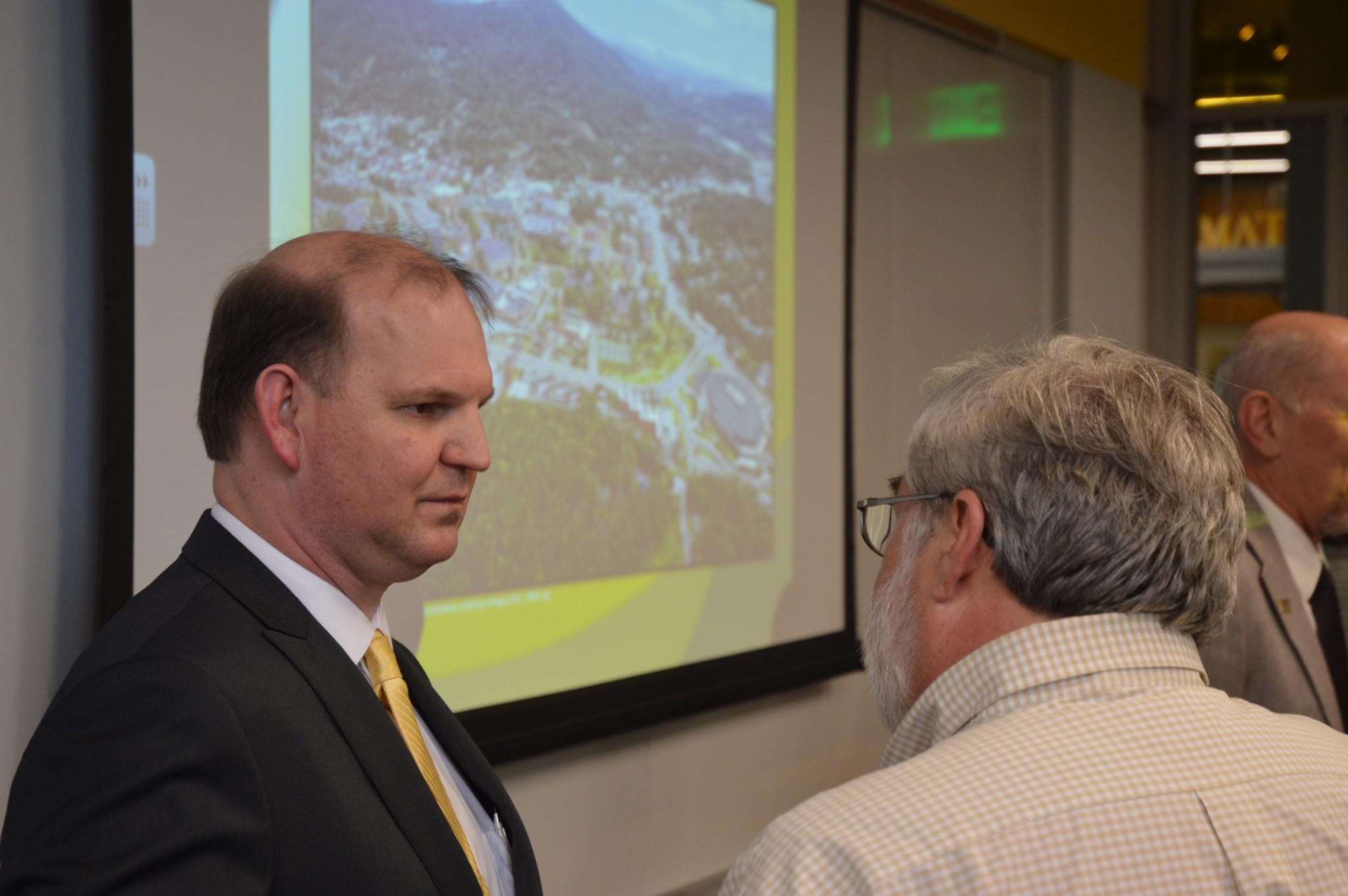 Darrell Kruger (left) speaks with an Appalachian State University faculty member after his open forum on Monday, March 16. Chancellor Sheri N. Everts announced on Wednesday that Kruger accepted the position offer and will effectively begin his tenure July 1, 2015.

Gerrit Van Genderen | The Appalachian