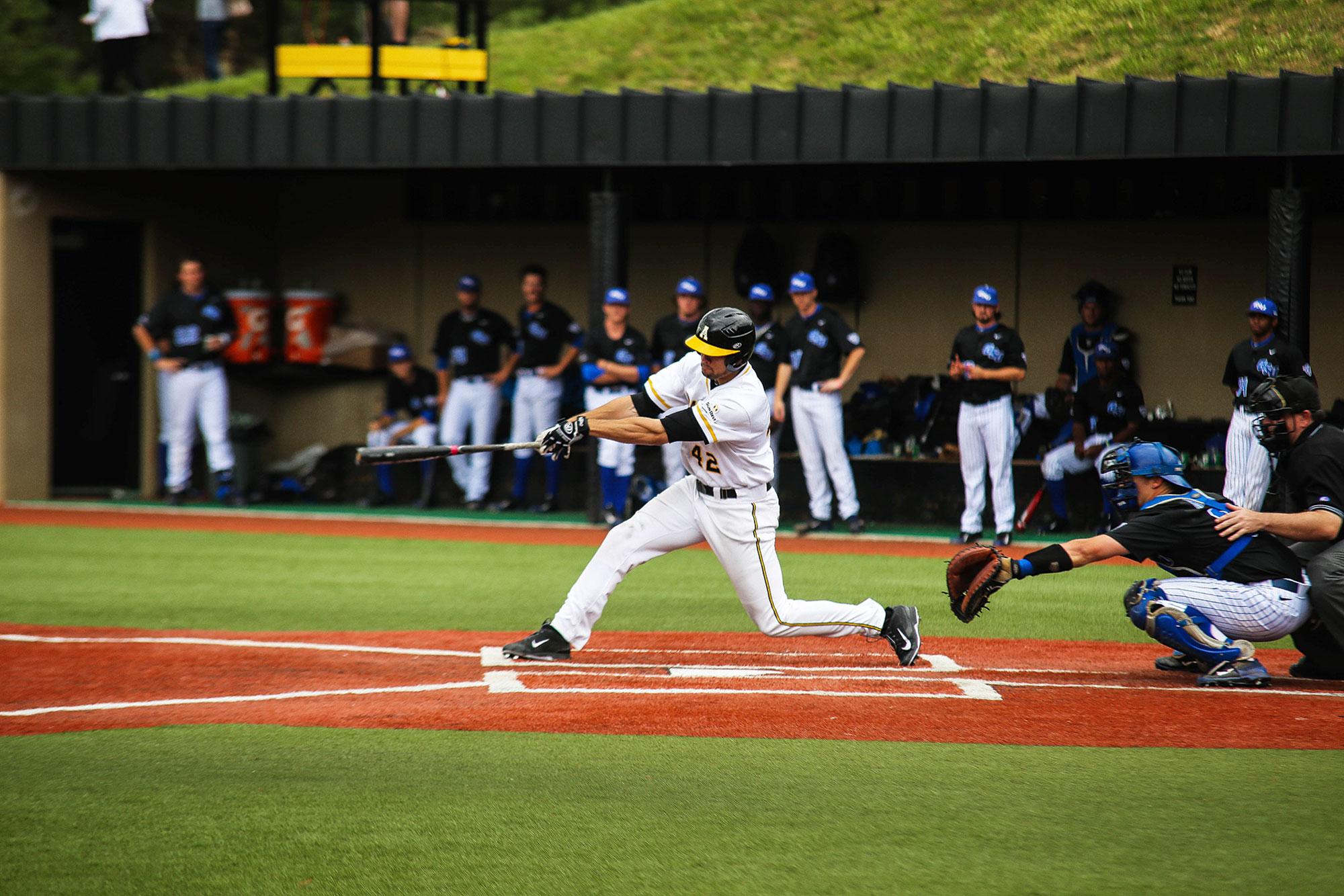 Junior infielder Dillon Dobson follows through on a double against Georgia State in early April. Dobson has hit .406 over the past eight games with seven RBIs. Photo by Gerrit van Genderen  |  The Appalachian
