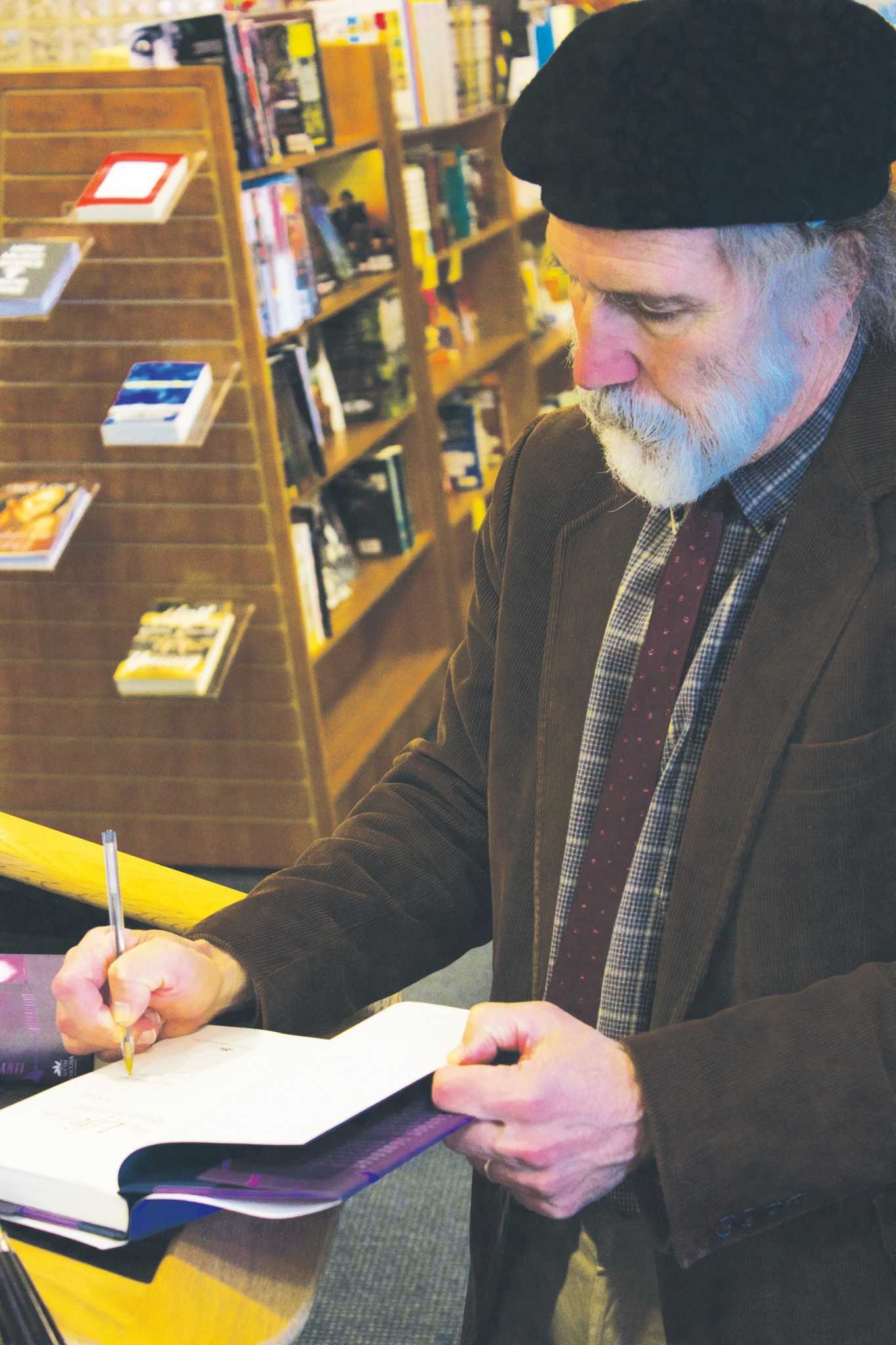 Appalachian English professor and North Carolina Poet Laureate read from his new book, “The Life of the World to Come” at a book signing in the university bookstore Monday. 