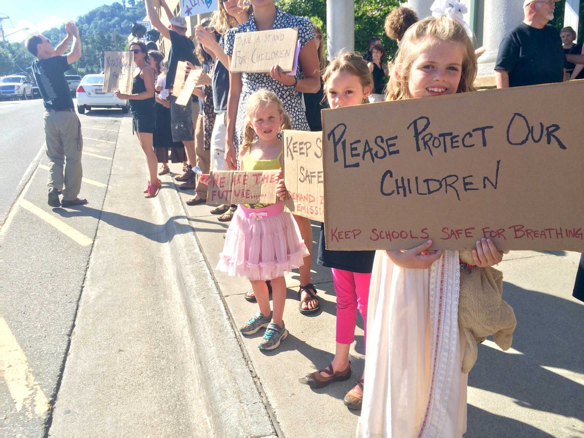Community members protest proposed asphalt plant