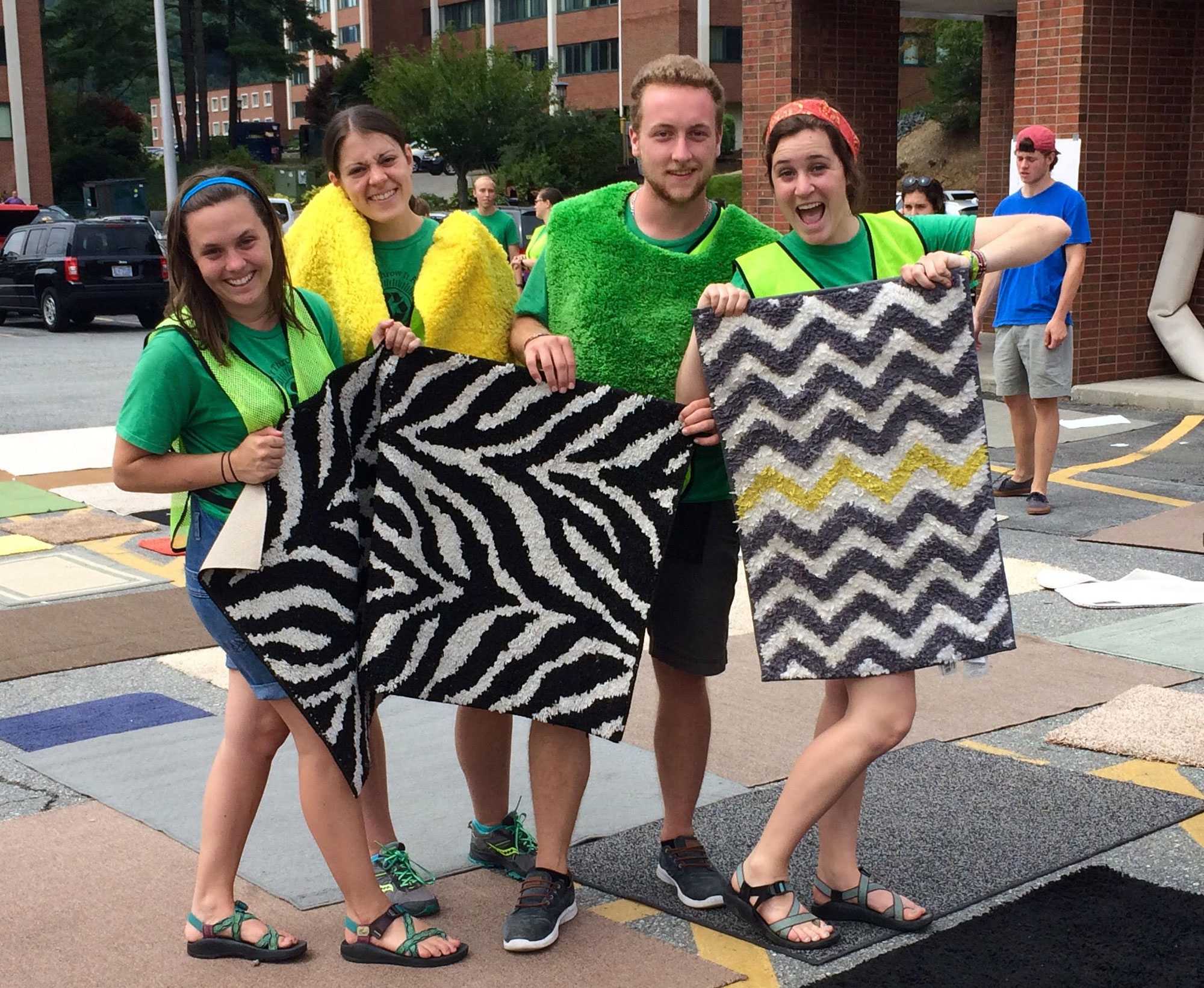 (From left to right) Erica Wolschlag, Kelsey Trebethan, Evan Montpellier and Meredith Rawl work the “Big Sale” hosted by the Appalachian Community Together (ACT) office. Photo by Kelsey Hamm, A&E Editor