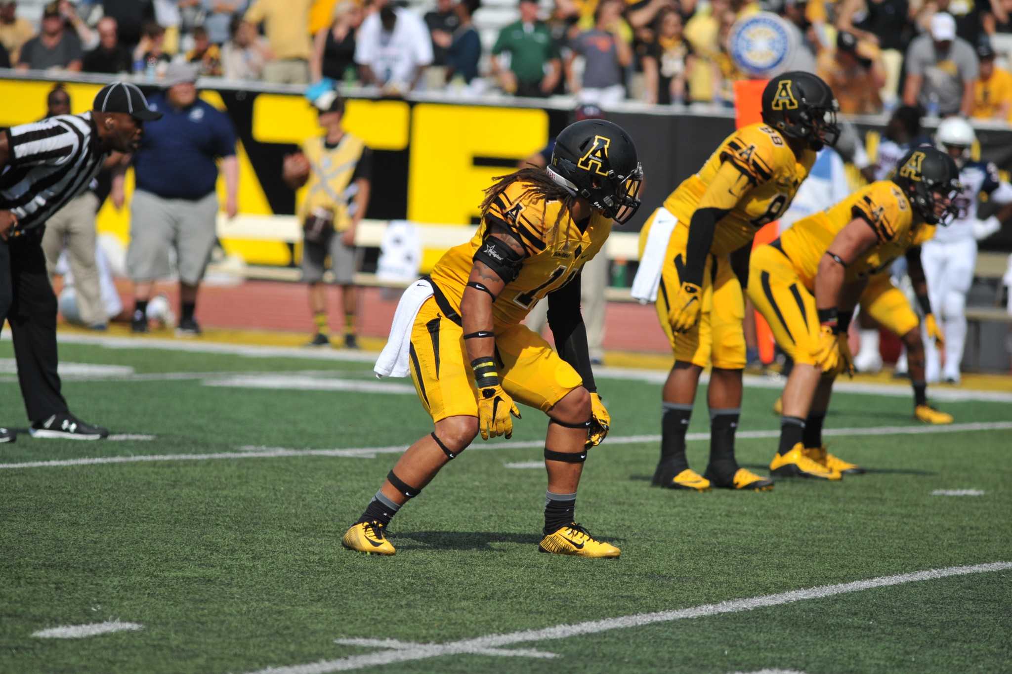 Sophomore linebacker Devan Stringer awaits the snap to rush the passer in App States home opener against Howard. The Mountaineers won 49-0. 

Credit: Appalachian State athletics/Dave Mayo