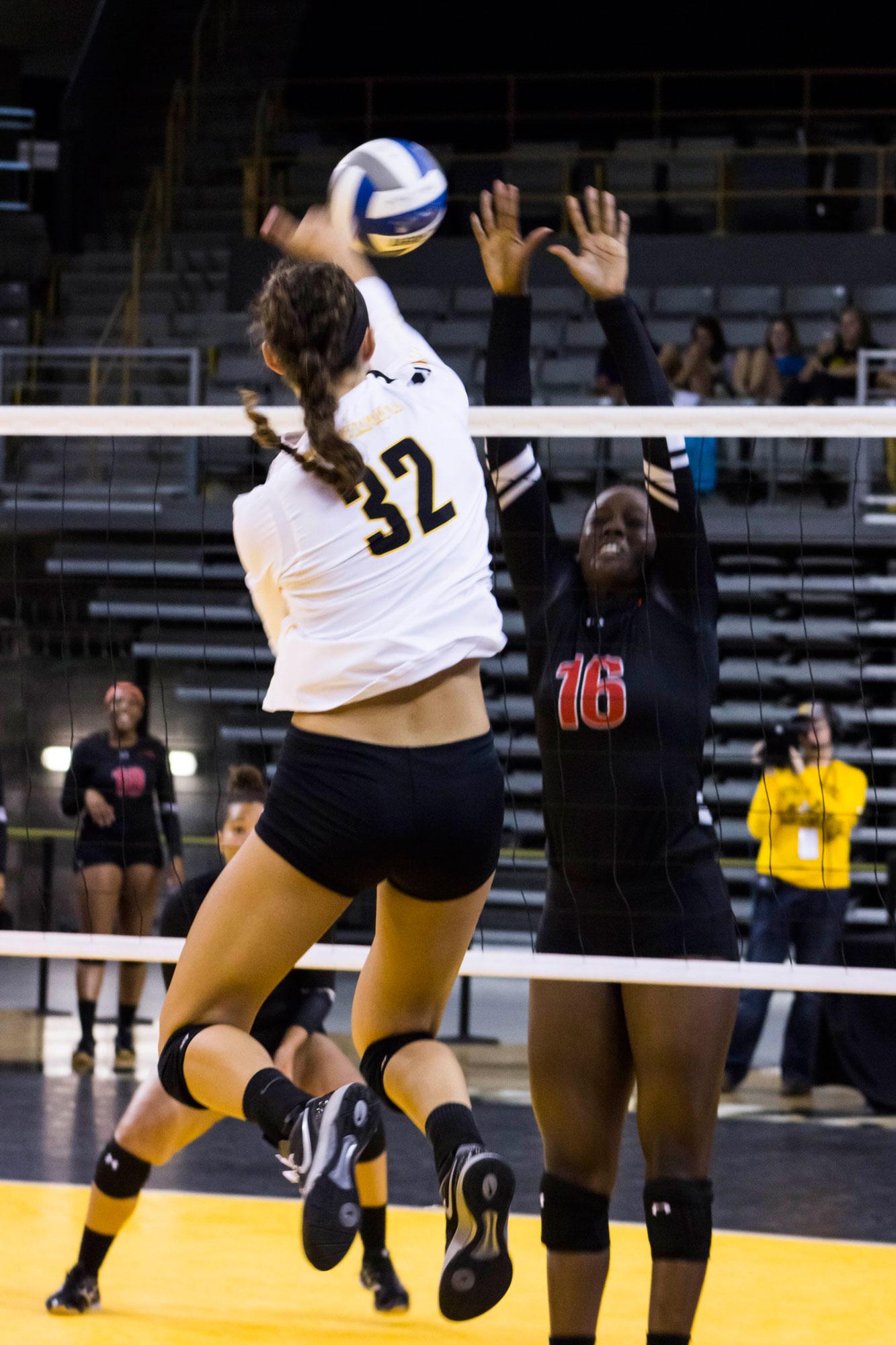 Senior outside hitter Jess Keller spikes the ball down during the first game of the season versus Gardner-Webb on Tuesday night. App State secured a 3-0 win over Gardner-Webb. | Photo: Halle Keighton