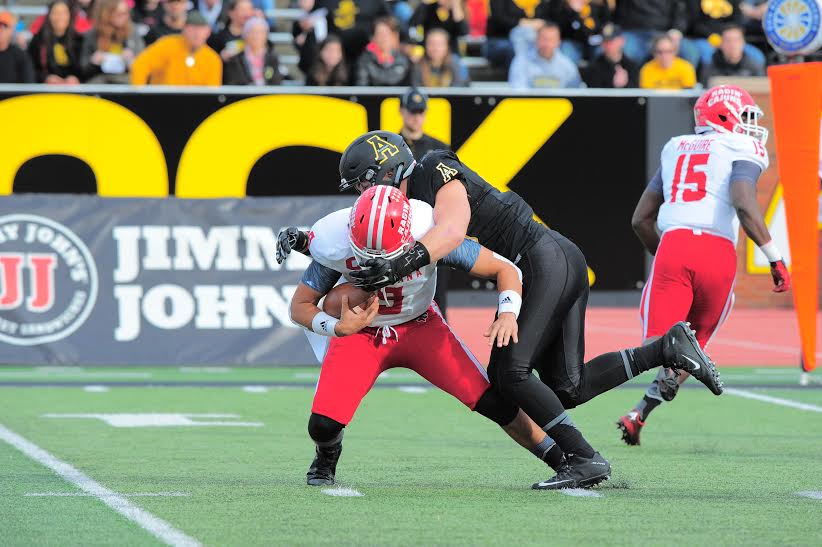 Linebacker Eric Boggs sacks quarterback Brooks Haack for the first of three sacks during Saturdays game against Louisiana Lafayette. The Mountaineers won 28-7, putting them at 9-2 on the season.  Photo courtesy of Appalachian State athletics/Keith Cline 