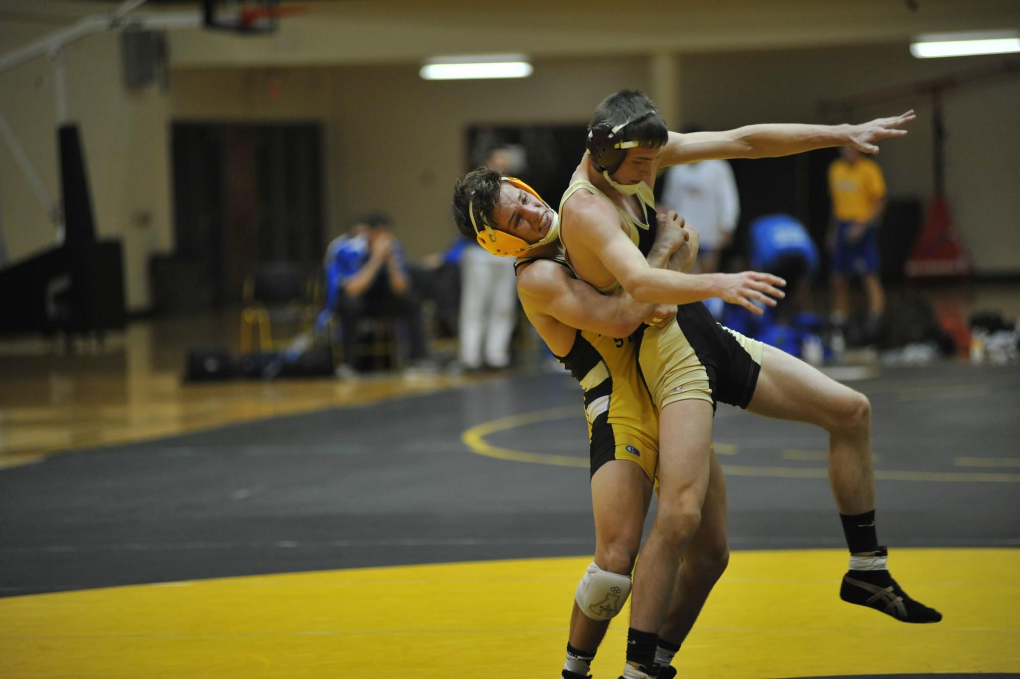 Sophomore Jacob Grigg grapples an opponent during one of three matches on Saturday. The Mountaineers are 3-0 so far this season.