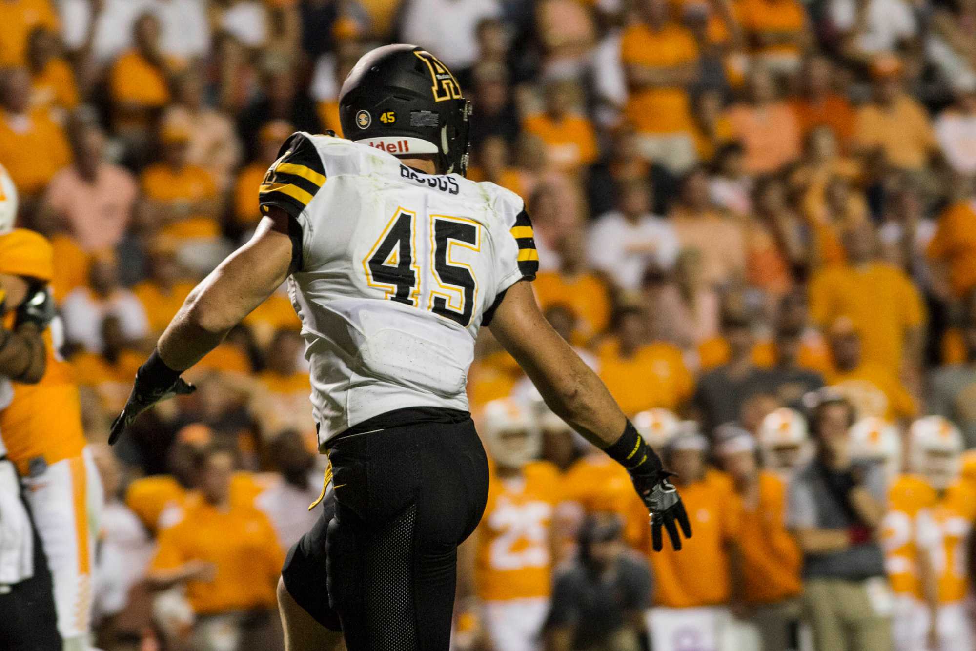 Junior Inside Linebacker, Eric Boggs, looks back towards his teammates during the game against Tennesse in 2016. The Mountaineers lost the away game in overtime with the final score being 20-13.