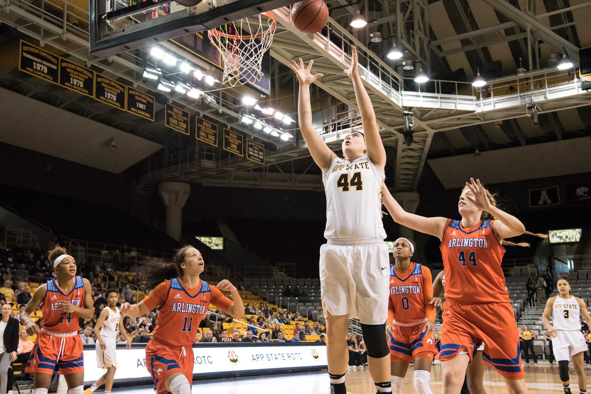 Freshman center Bayley Plummer, makes an attempt to score a basket during the game against UT Arlington. The Mountaineers lost the the Mavericks with the final score being 62-73.