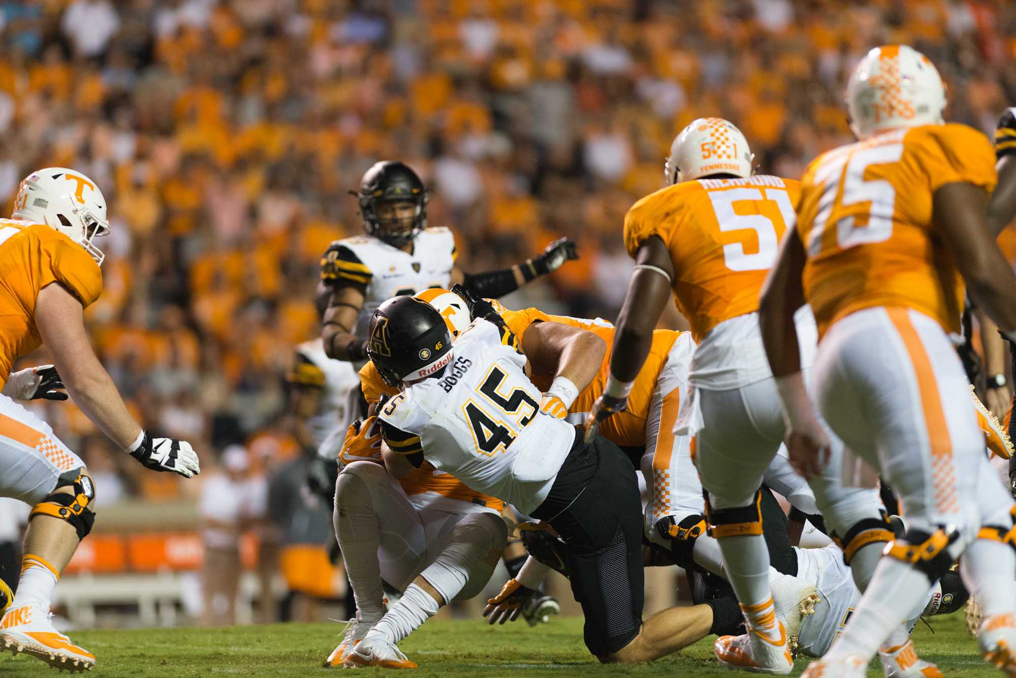 Junior inside linebacker Eric Boggs with one of his 12 tackles on the night of a hard fought game by the Mountaineers.
