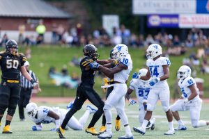 Wide receiver Jaquil Capel in an altercation with Georgia State cornerback Chandon Sullivan. The Mountaineers finished with nine penalties for a loss of 101 yards