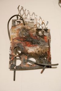 This piece was created by E Earl with steel and plaster. The art work is hanging up in Nth Gallery and was included in the New River Art Exhibit on February 3, 2017.