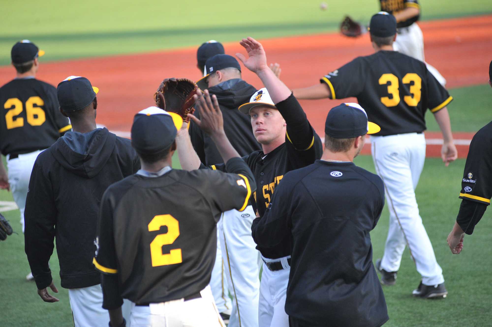Freshman left-handed pitcher Bobby Hampton celebrates a successful defensive inning with his teamates during last weekend’s series against South Alabama.  Photo courtesy of DC Mayo/App State Athletics.