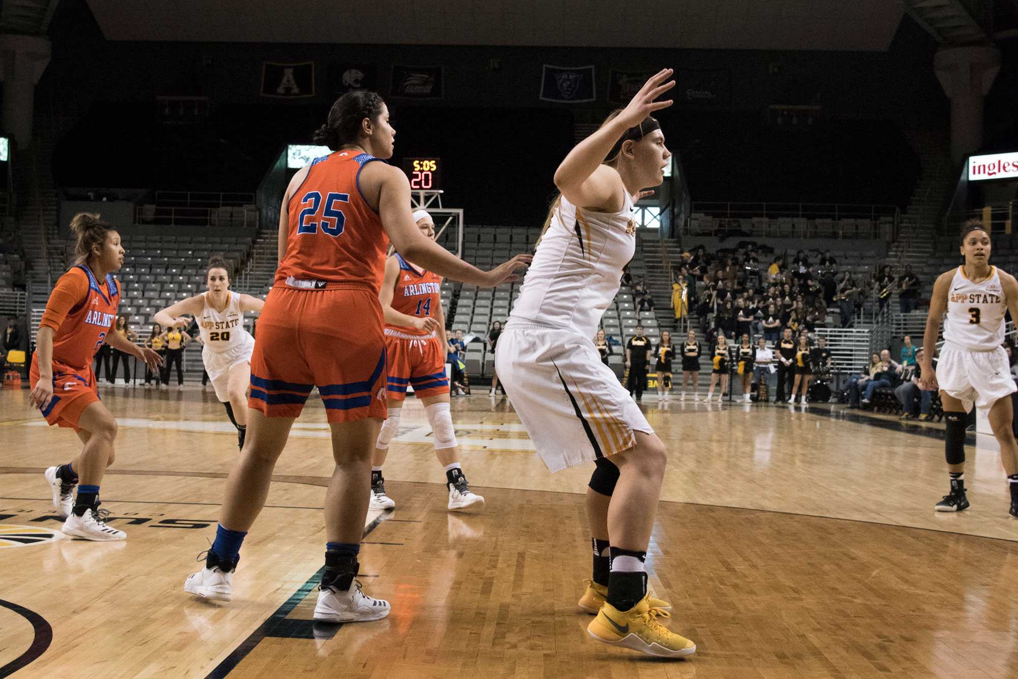 Freshman center/forward Bayley Plummer attempts to block the pass  during the game against UT Arlington. 