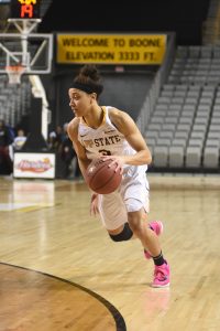 Senior guard, Bria Carter, dribbles the ball down the court during the game against Little Rock in the Spring of 2016.
