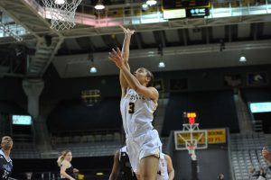 Senior guard, Bria Carter, goes up for the shot during a season game in 2016. 