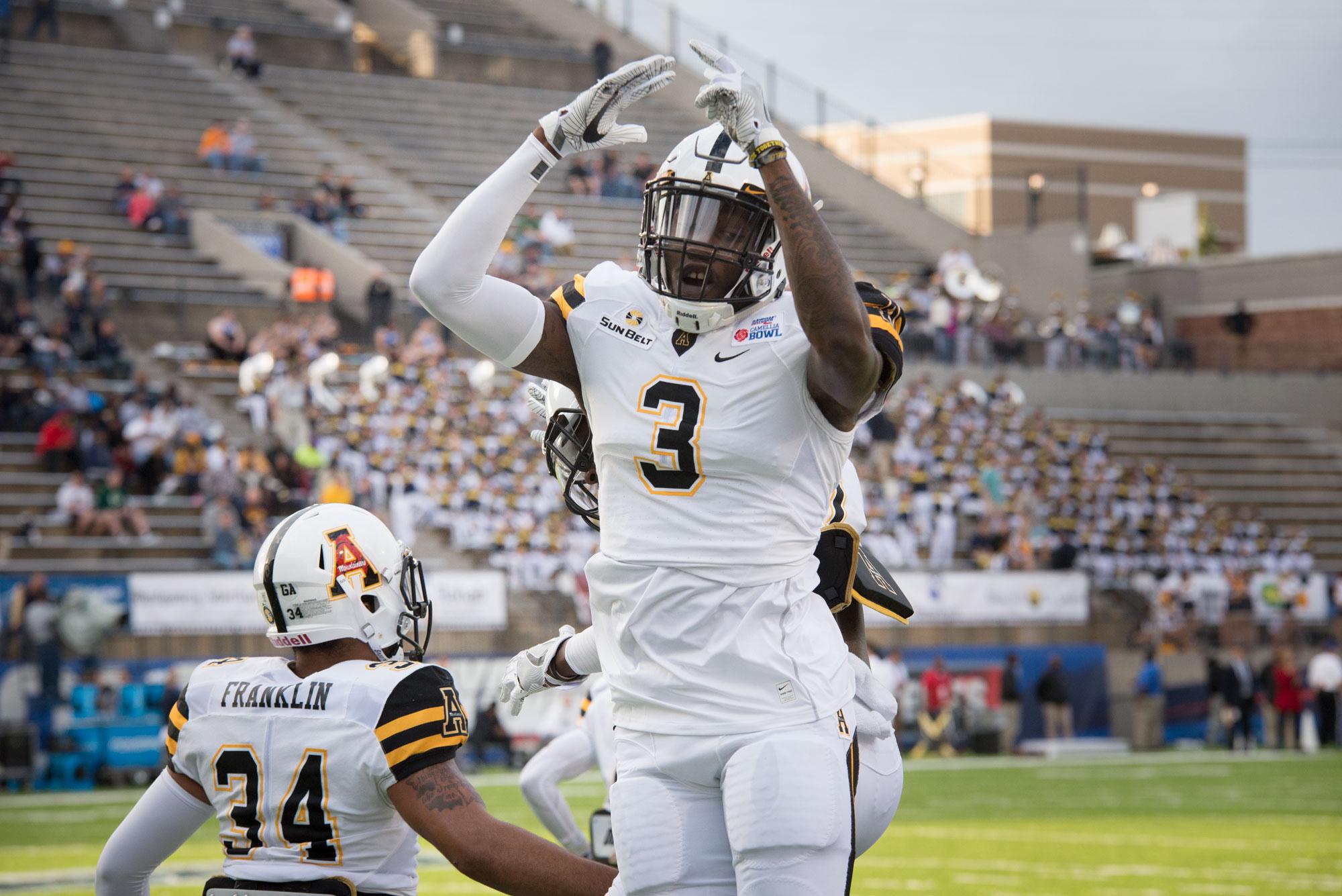 Darrynton Evans warming up before the Camellia Bowl in 2016. The Mountaineers defeated Toledo 31-28.