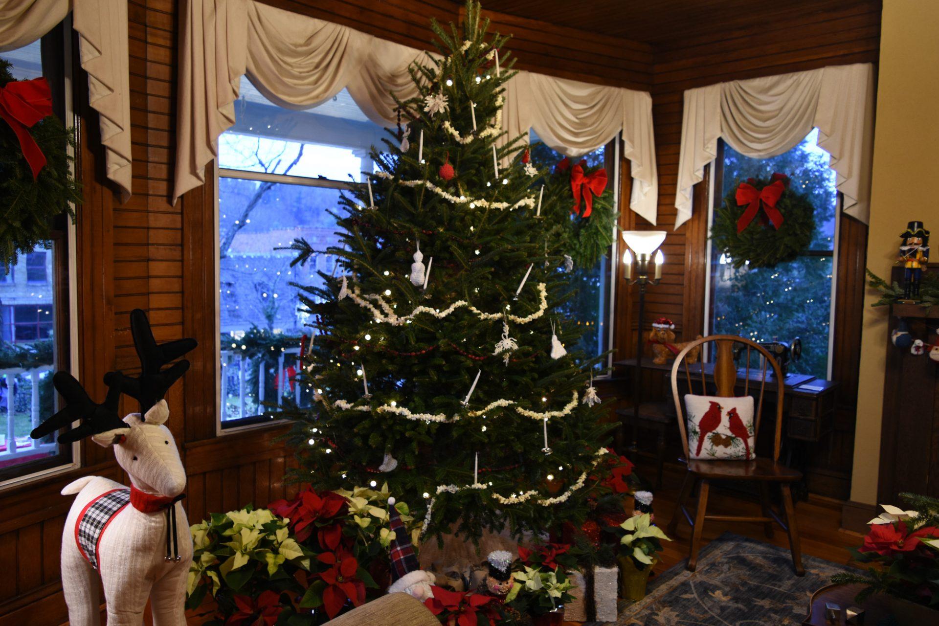 A Christmas tree celebrates the holiday season inside the Jones House.