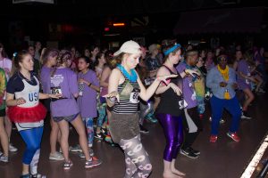 Students attempring the choreographed line dance in their wacky outfits during Dance Marathon. As a result of the 15 hour event, the dancers were able to raise over 39,000 dollars for the Western Youth Network and Parent To Parent.