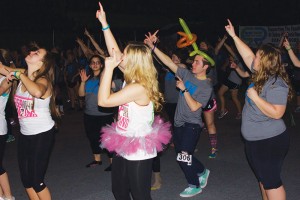 People dancing during the group portion of Dance Marathon where they all learned a dance together. Dance Marathon was held in Holms Convication Center and it started on Saturday, February 21st at 10am and it ended the next morning at 1am.