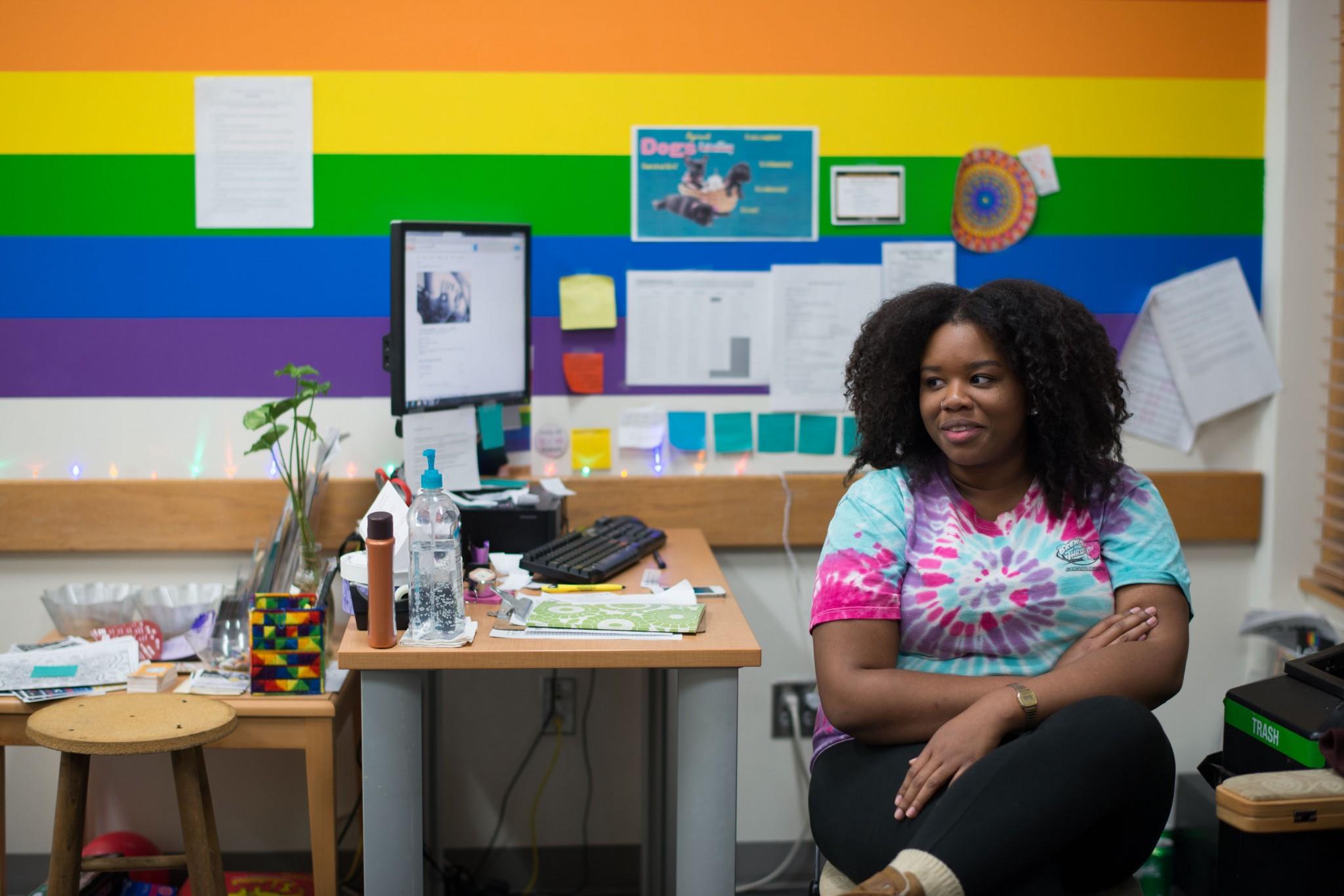Sophomore English major Ariel Green runs a desk shift at the LGBT Center in Plemmons Student Union on Monday night.