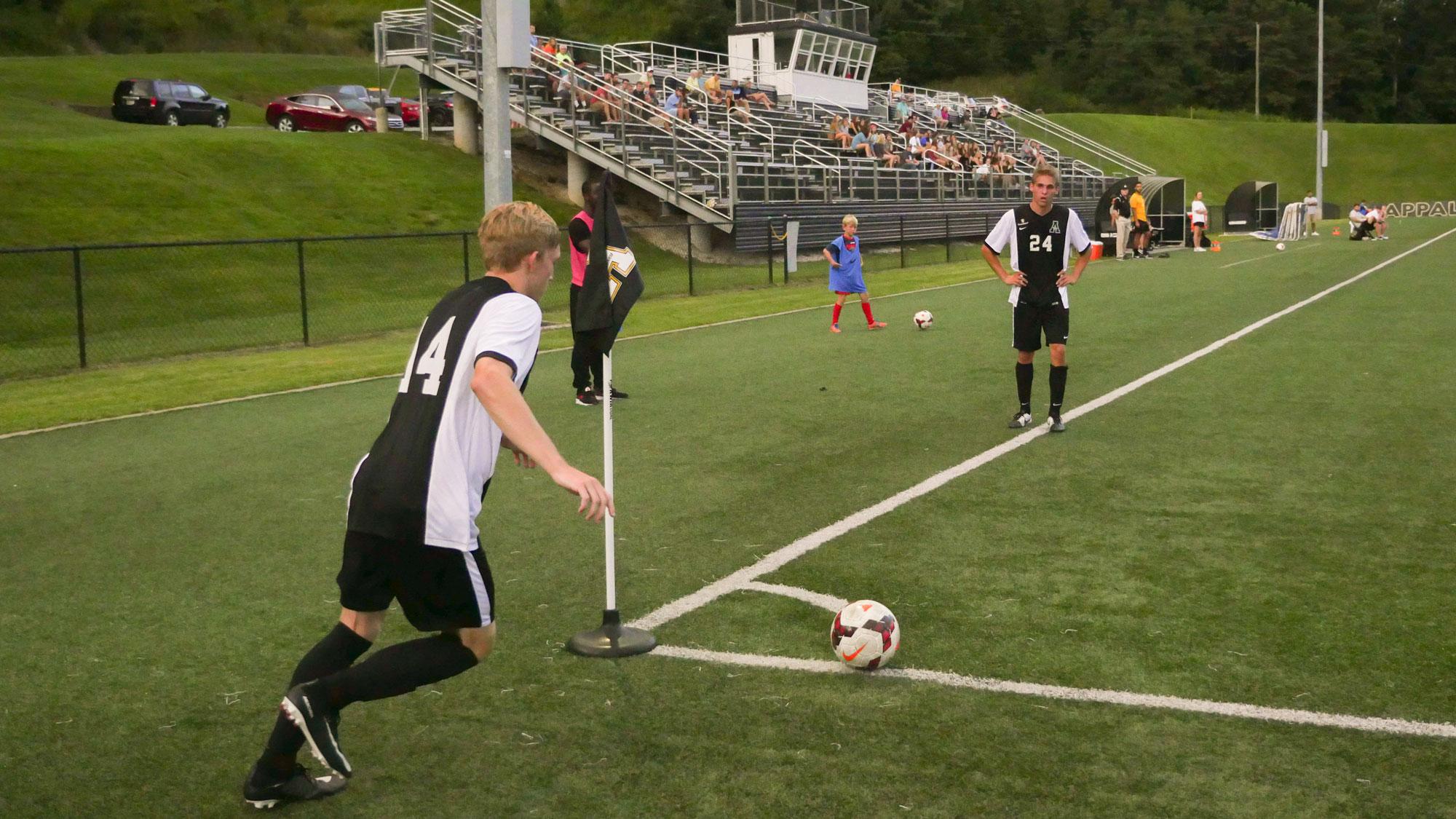 Freshman Reed Honnicutt doing a corner kick during the exhibition game on Wednesday, August 16th.