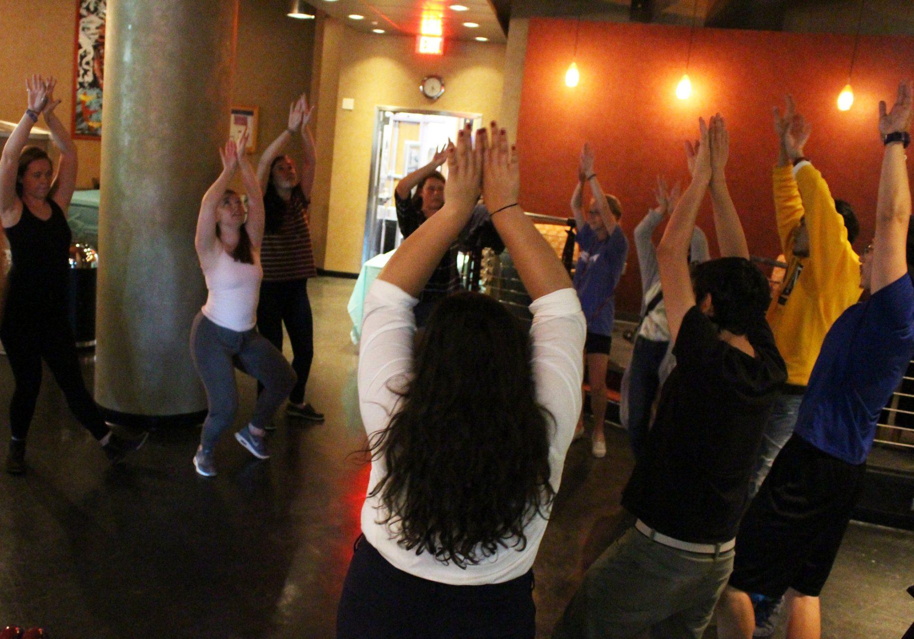 International student Brooke Waldron teaching other students dances that are popular where she lives in the United Kingdom. The first Global Exchange of the semester was held on Sept. 27 in White Water Cafe in the student union. 
