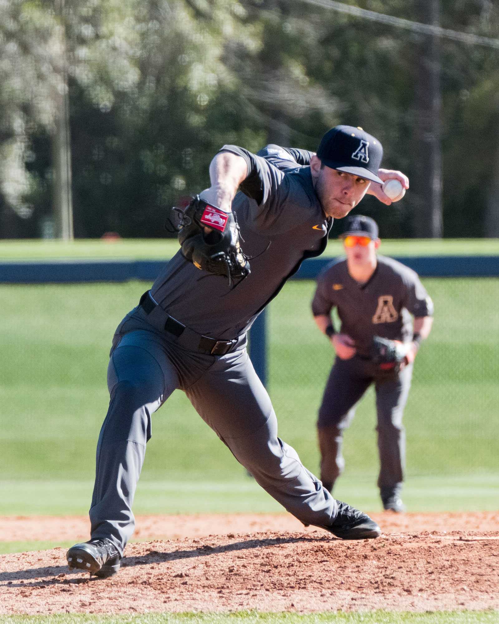 Senior pitcher Tristan Helms throwing a pitch during a game in the 2017 season. 