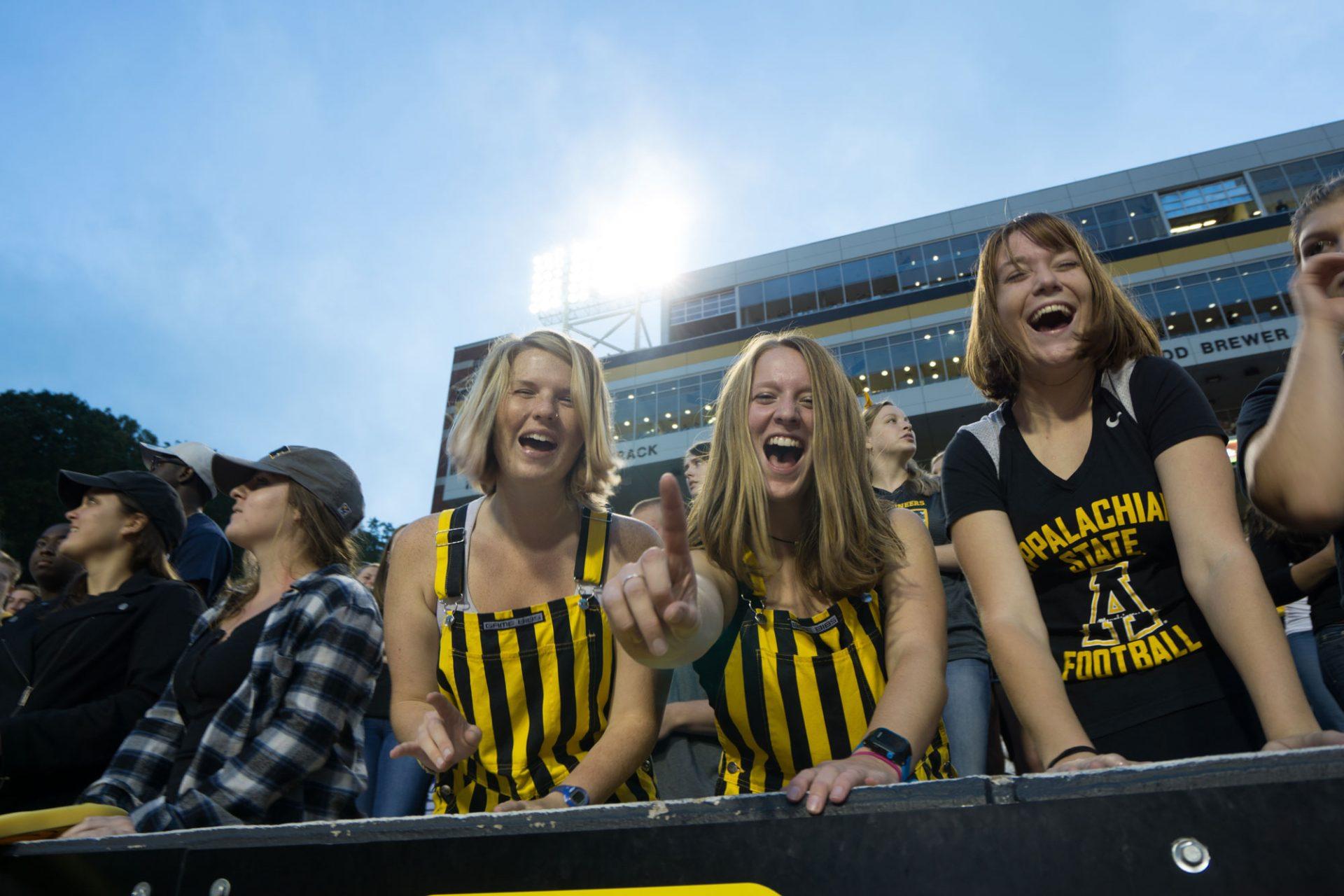 Fans+react+as+the+Mountaineers+secure+the+Homecoming+game+with+one+last+touchdown.