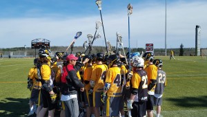 The App State club lacrosse team huddles following their 11-6 victory over Wofford on Sunday. Photo courtesy of Grant Simpkins.